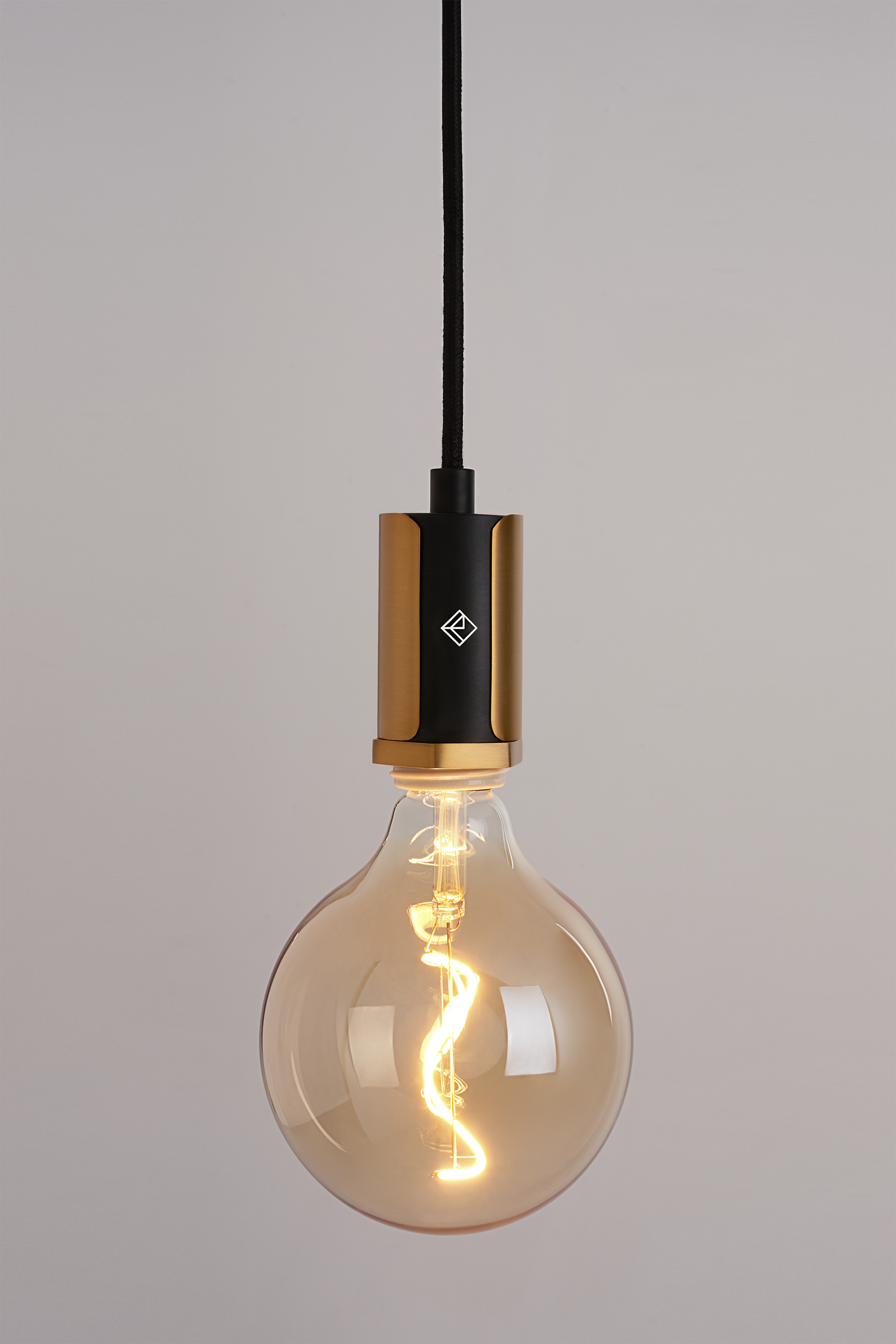 The Alamere Plug-In Pendant is the ideal swag kit lamp for any space. Easy to install, it plugs into any standard wall outlet and comes with two cord anchors to hang it anywhere. An inline dimmer on the cord allows for adjustability with any compatible dimming light bulb.